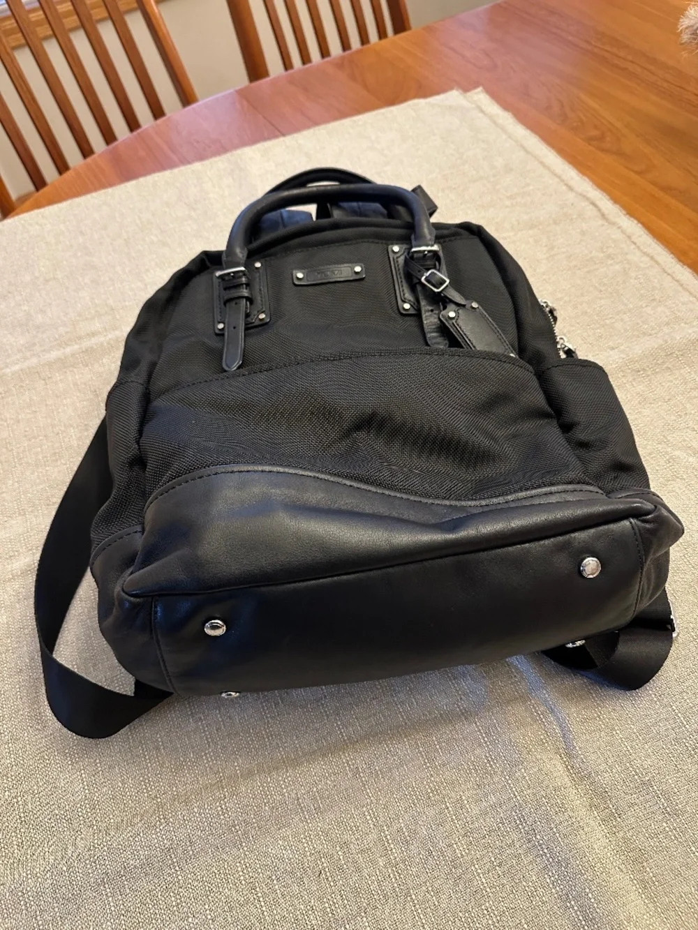Tumi leather trimmed